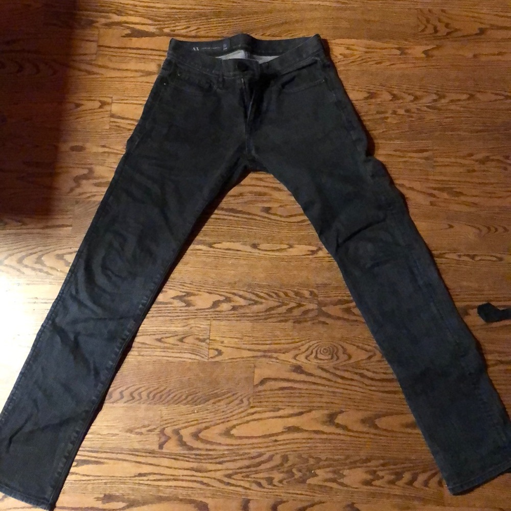 Black Armani Exchange skinny jeans.